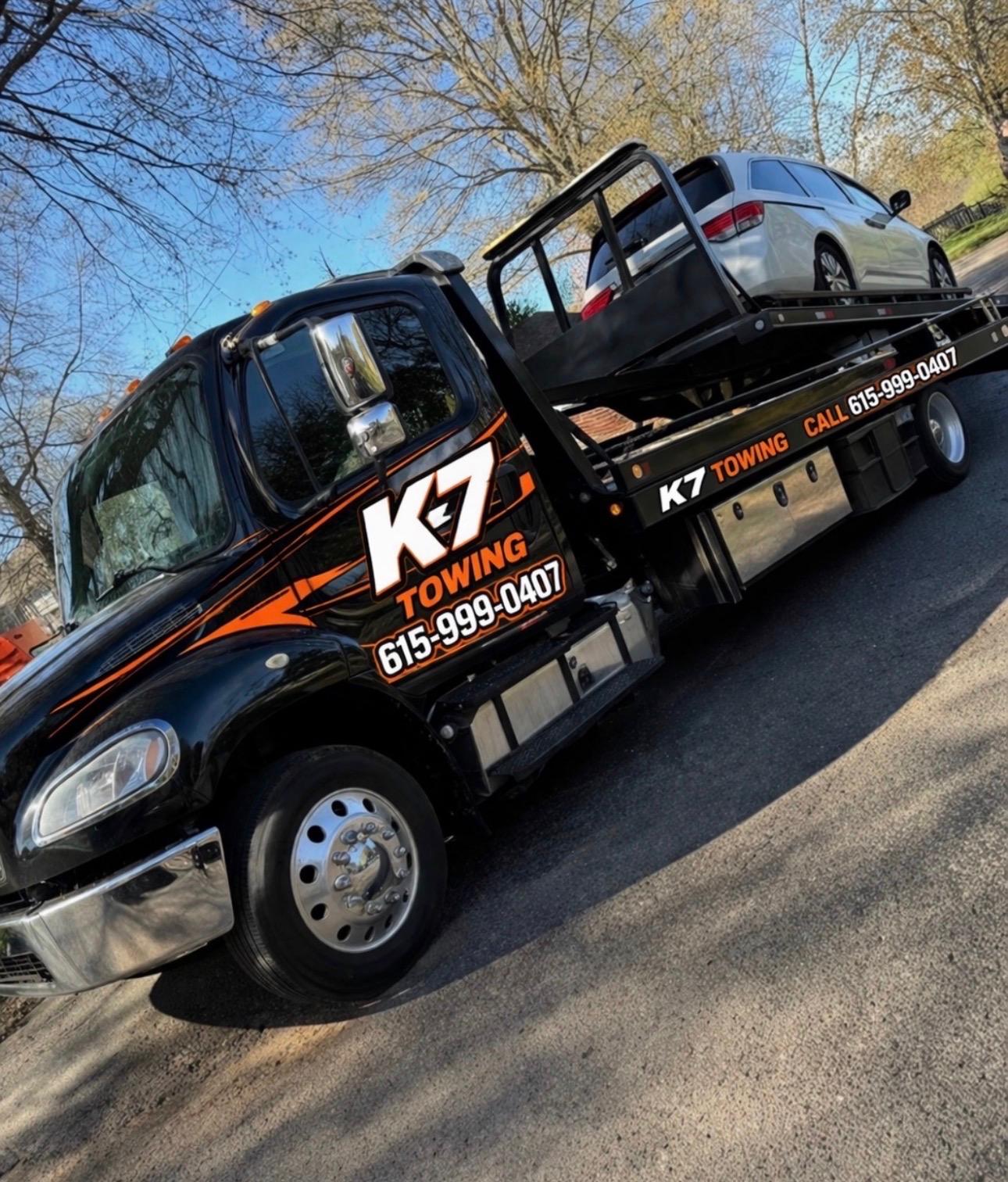 K7 Towing flatbed tow truck ready for 24/7 emergency dispatch